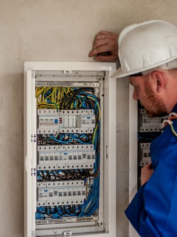 Electrician checking wires